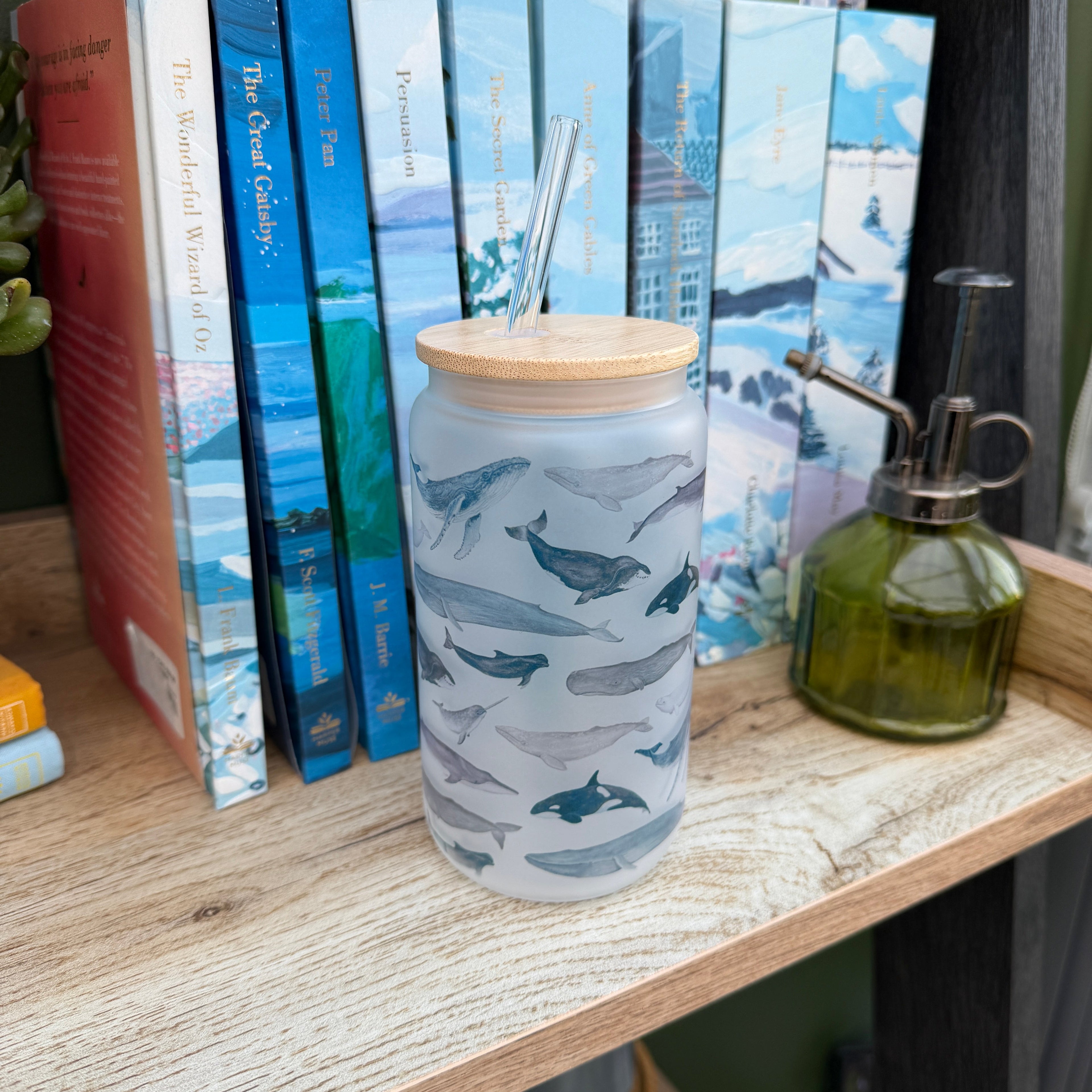 Glass tumber featuring whale paintings