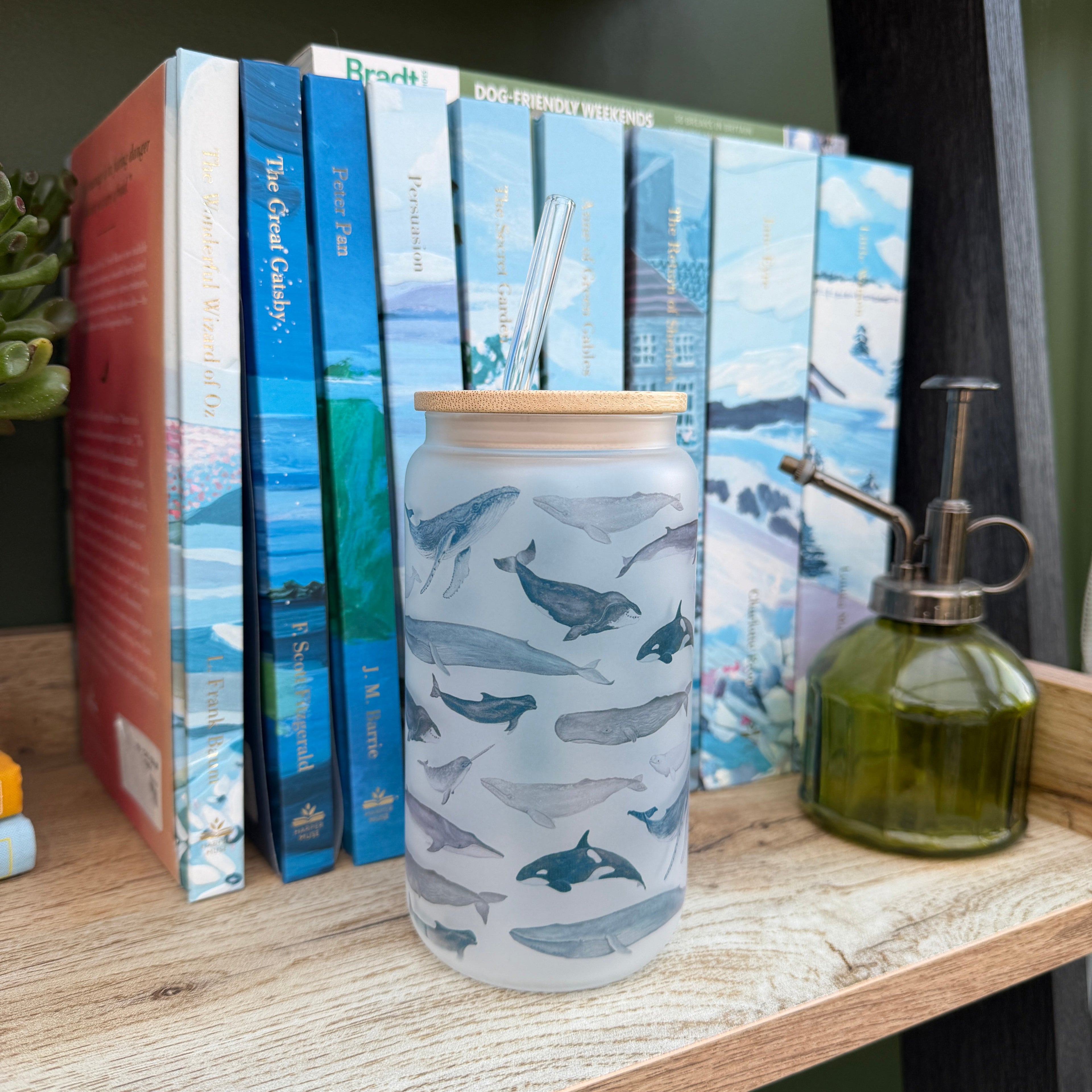 Glass tumber featuring whale paintings